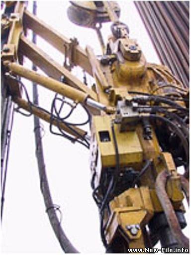 Верхний силовой привод для бурения скважин на нефть и газ компании Varco.